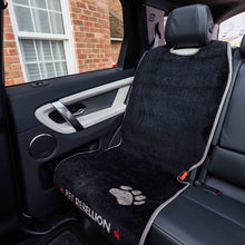 Load image into Gallery viewer, Car seat cover with 'Pet Rebellion' branding on a car seat