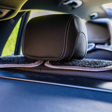 Load image into Gallery viewer, Car headrest cover in a car interior