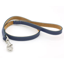 Load image into Gallery viewer, A prussian blue leather dog leash with light blue stitching, a tan interior lining, and a silver metal clasp, shown on a white background.