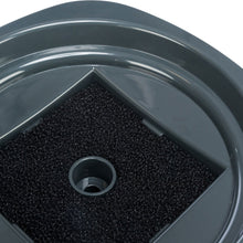 Load image into Gallery viewer, Close-up of a black rubber wheel with a central hub on a white background