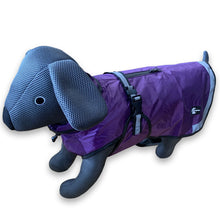 Load image into Gallery viewer, A purple dog raincoat with black harness straps and gray reflective trim, displayed on a black dog-shaped mannequin against a white background.