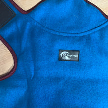 Load image into Gallery viewer, Blue dog vest with DryDogs logo on a wooden surface

