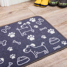 Load image into Gallery viewer, Pet-themed doormat with dog and bone patterns on a wooden floor.
