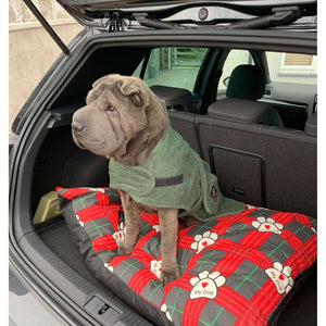 Straight from the beach and into the boot. The dog towelling dry robe is perfect for any wet dog