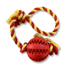 Load image into Gallery viewer, red molar ball dog toy on rope with teeth for treats
