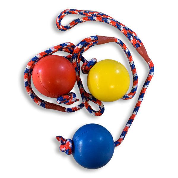 dog toys - rubber balls on rope with handle