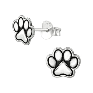 paw print earrings - sterling silver studs with black-outlined paw design
